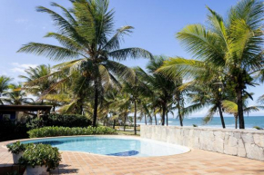 Casa pé na areia com garagem na Praia de Guarajuba